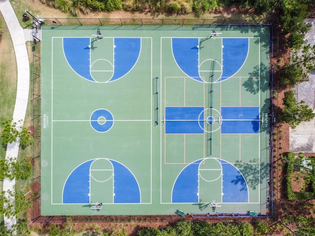 view of sport court featuring community basketball court and fence