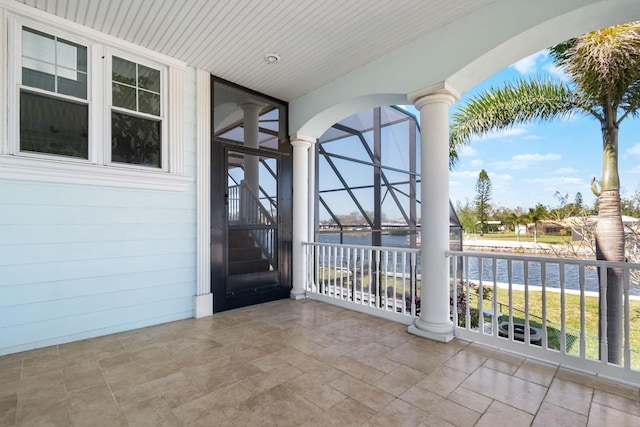 view of patio / terrace featuring a water view