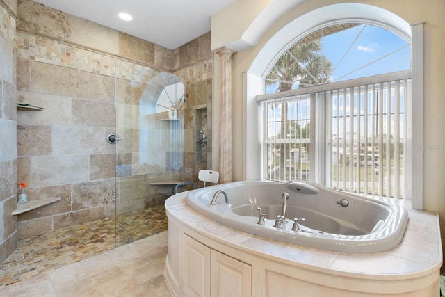 full bathroom featuring a jetted tub and a walk in shower