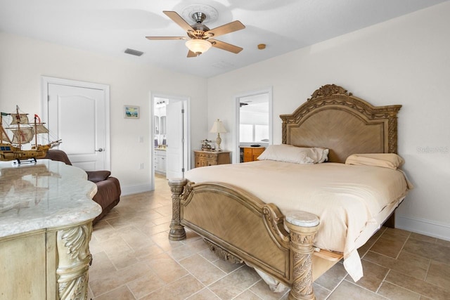 bedroom with visible vents, baseboards, ensuite bath, and a ceiling fan