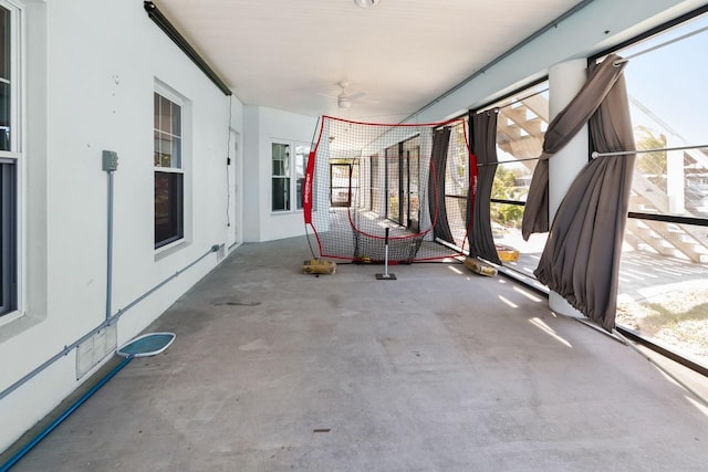 interior space with a ceiling fan