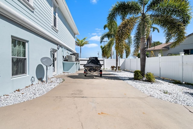 view of patio featuring fence