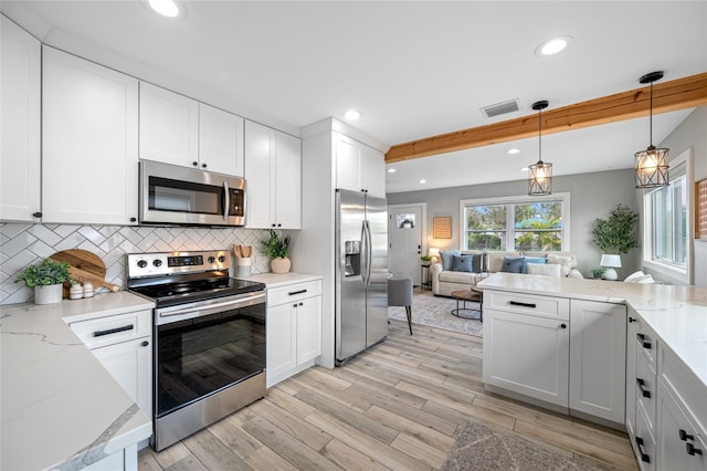 kitchen featuring visible vents, decorative backsplash, open floor plan, stainless steel appliances, and recessed lighting