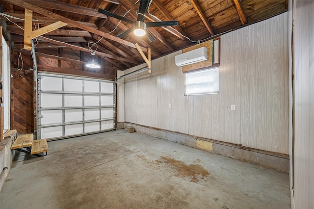 garage featuring a wall mounted air conditioner