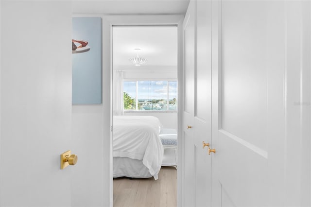 bedroom featuring wood finished floors