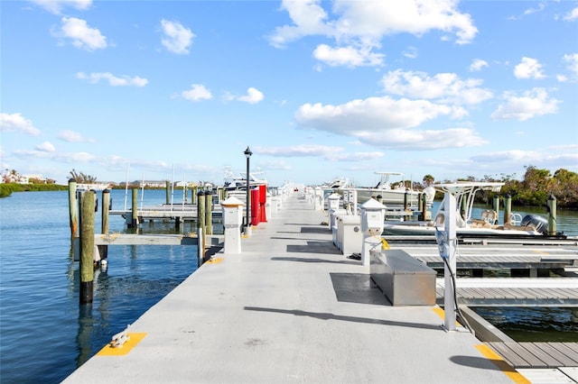 view of dock featuring a water view and boat lift