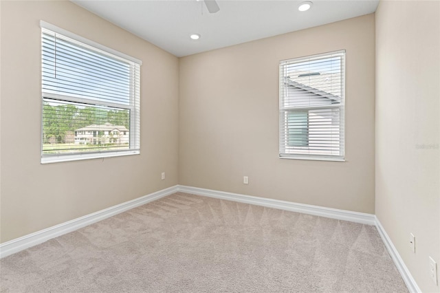 unfurnished room with carpet floors, recessed lighting, a ceiling fan, and baseboards