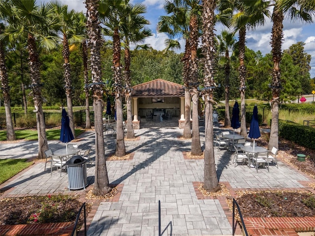 view of patio / terrace featuring fence and a gazebo