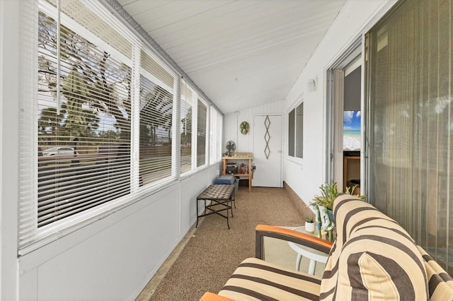 sunroom / solarium with lofted ceiling