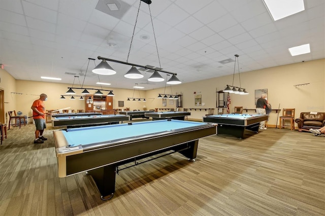 recreation room with light colored carpet and pool table