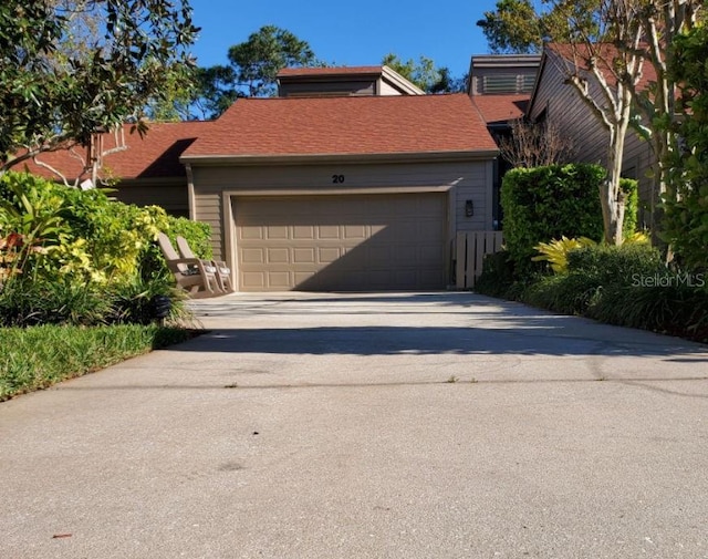 exterior space with concrete driveway