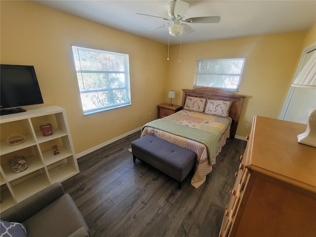 bedroom featuring ceiling fan, baseboards, and dark wood-style flooring