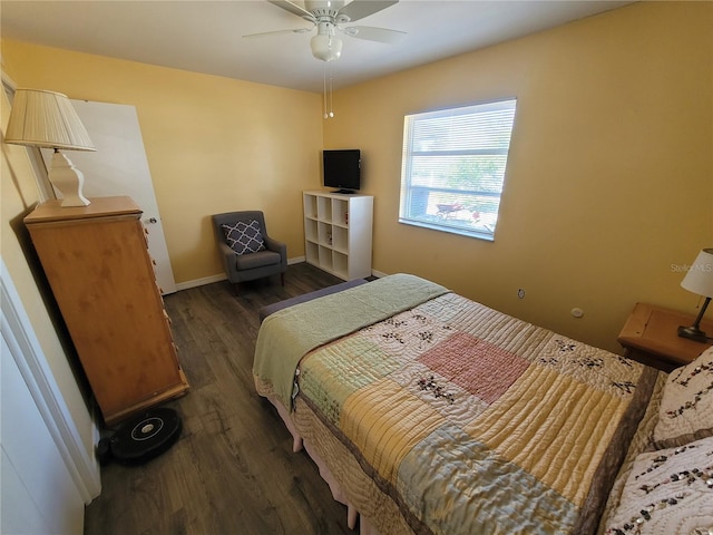 bedroom with dark wood finished floors, baseboards, and ceiling fan