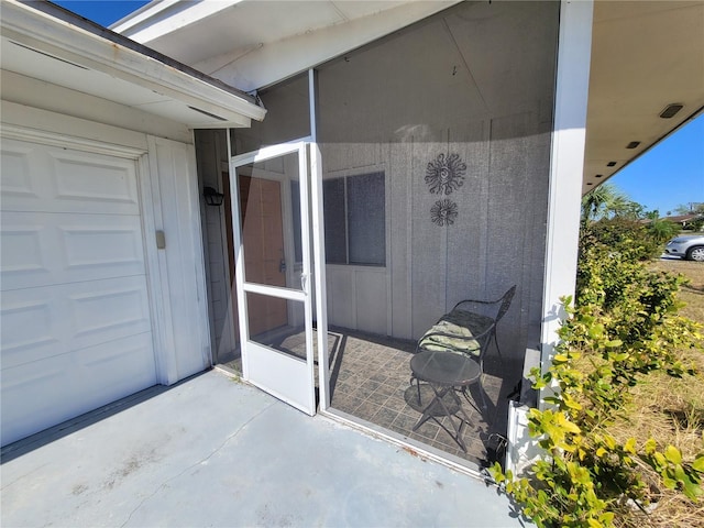 view of patio featuring a garage