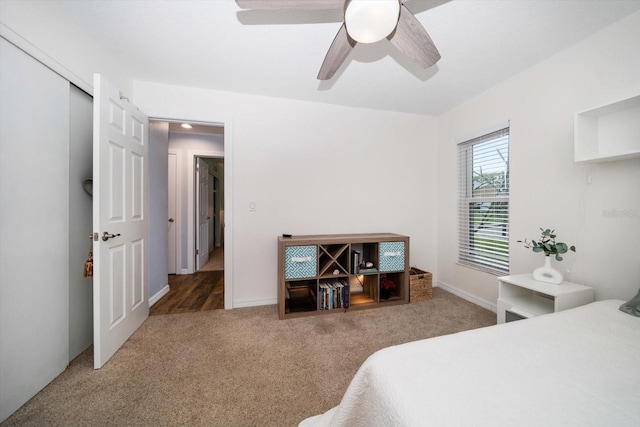 bedroom featuring carpet floors and a ceiling fan