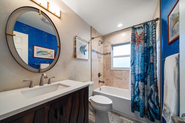 bathroom with shower / bath combo, vanity, and toilet