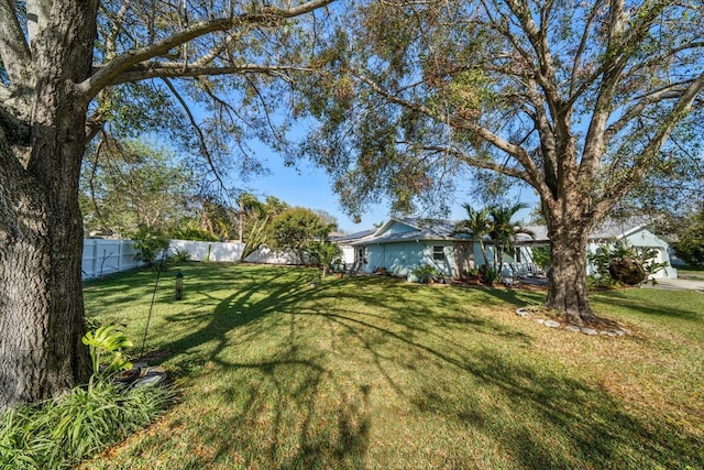 view of yard with fence