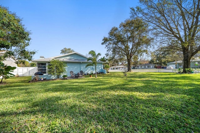 view of yard with fence