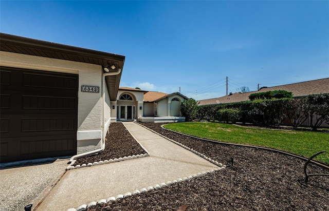 view of yard featuring a garage