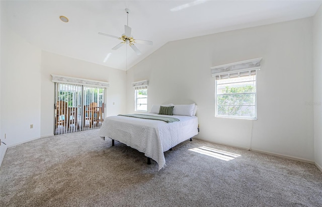 carpeted bedroom featuring lofted ceiling and ceiling fan