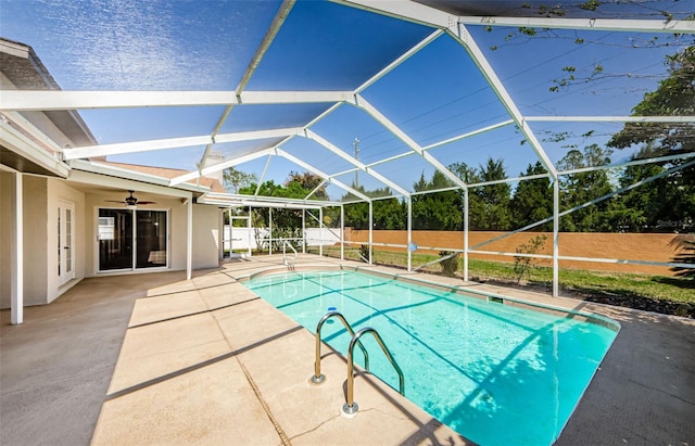 view of pool featuring a lanai, a fenced in pool, a patio, and a fenced backyard