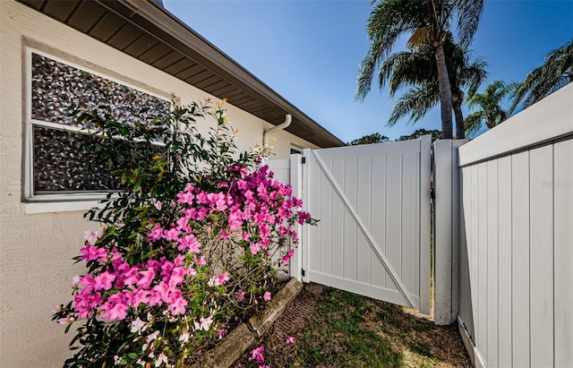 exterior space featuring a gate and fence