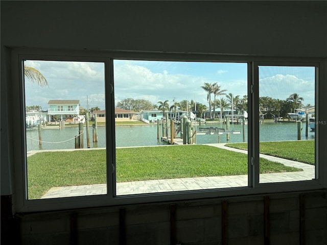 entryway featuring a water view and a residential view