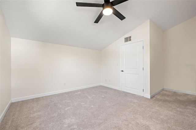 bonus room featuring visible vents, lofted ceiling, carpet, and baseboards