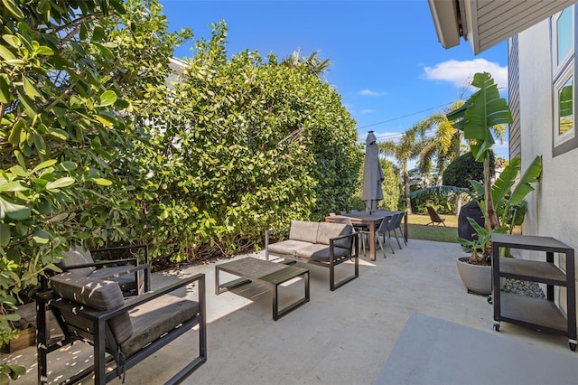 view of patio with outdoor dining area