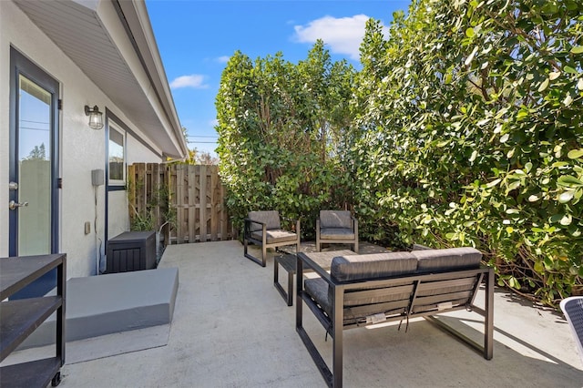 view of patio / terrace featuring fence