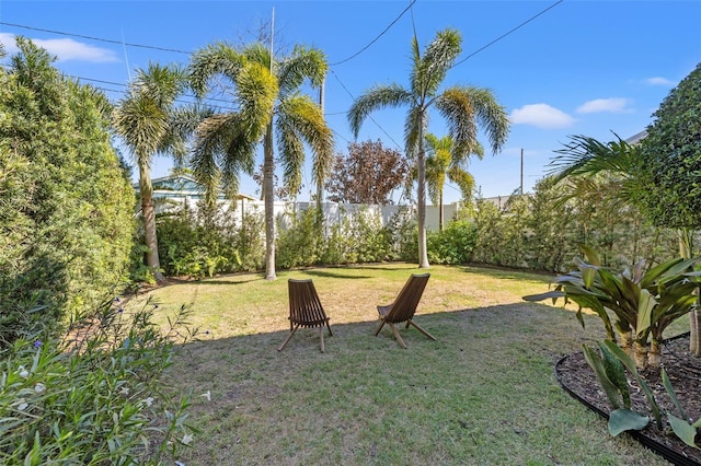 view of yard with fence