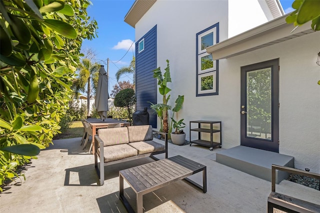 view of patio featuring outdoor dining area