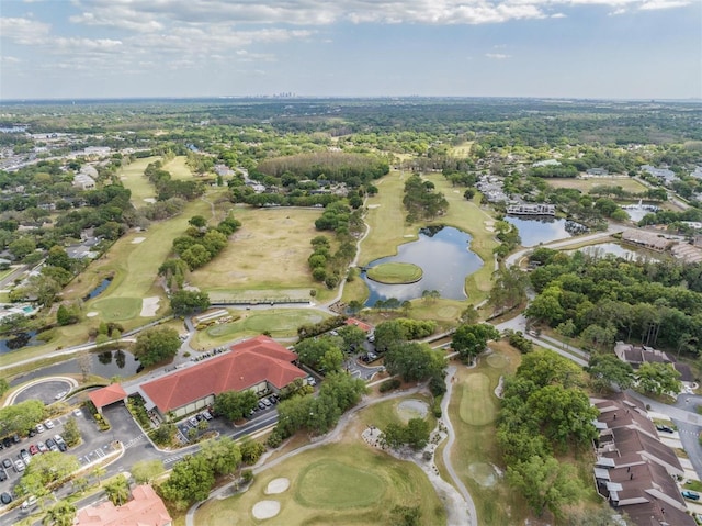 aerial view featuring view of golf course and a water view