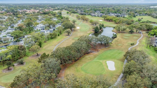 drone / aerial view featuring a water view and golf course view