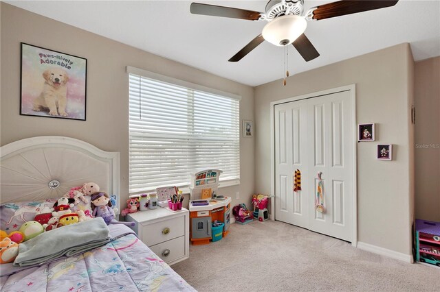 1773 Yellow Trl, Lakeland, FL 33801 - bedroom with a ceiling fan, a closet, light carpet, and baseboards