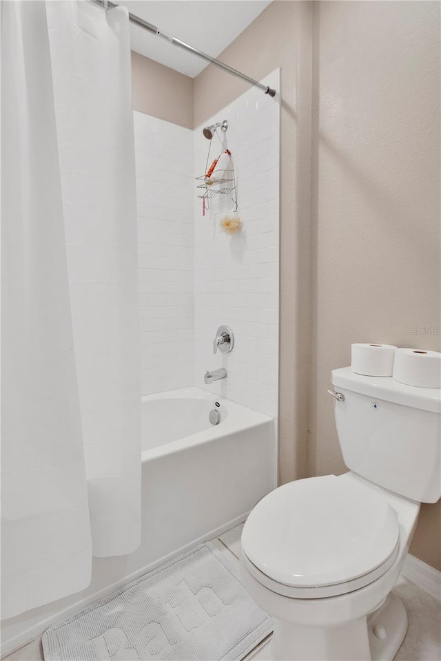 1773 Yellow Trl, Lakeland, FL 33801 - bathroom featuring shower / bath combo and toilet