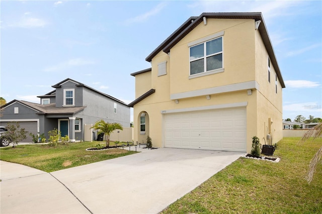 1773 Yellow Trl, Lakeland, FL 33801 - view of front of house featuring driveway, a front lawn, an attached garage, and stucco siding