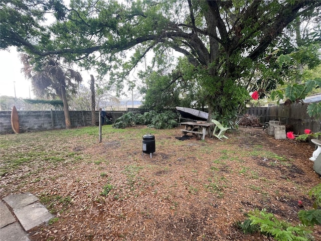 view of yard with a fenced backyard