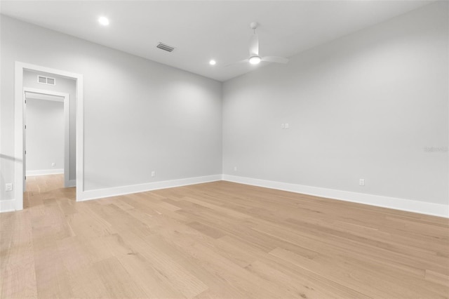 spare room with visible vents, baseboards, a ceiling fan, light wood-style floors, and recessed lighting