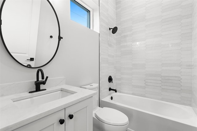 full bathroom featuring washtub / shower combination, vanity, and toilet