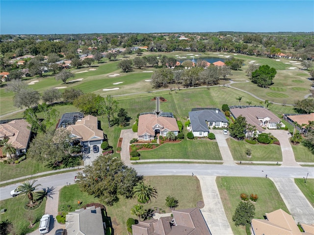 birds eye view of property with a residential view and golf course view