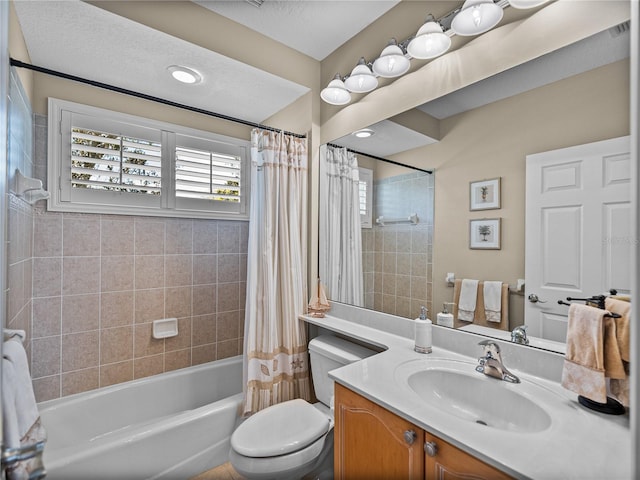 full bath featuring visible vents, shower / tub combo, vanity, and toilet