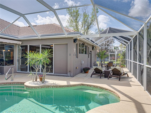 outdoor pool with a patio