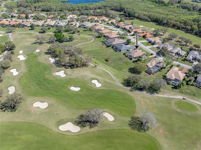 aerial view with view of golf course and a residential view