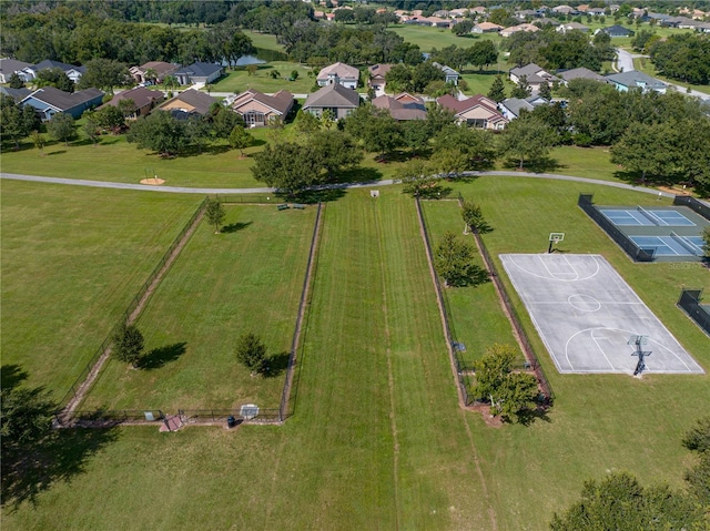 birds eye view of property with a residential view