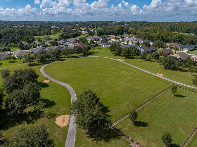 aerial view with a residential view and a wooded view