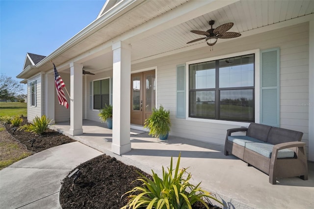 view of patio featuring french doors and a ceiling fan