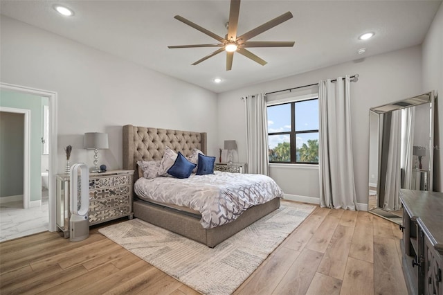 bedroom featuring a ceiling fan, recessed lighting, light wood-style flooring, and baseboards