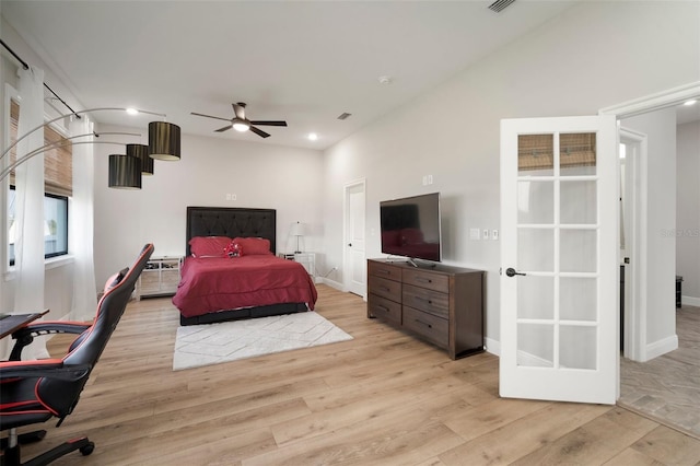 bedroom featuring visible vents, baseboards, light wood-style flooring, and recessed lighting