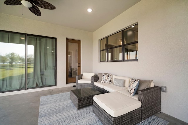 view of patio featuring an outdoor hangout area and a ceiling fan